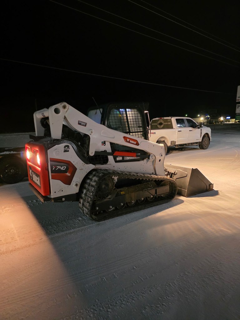 The Hotshot Land Solutions team ready for parking lot snow removal Tulsa.